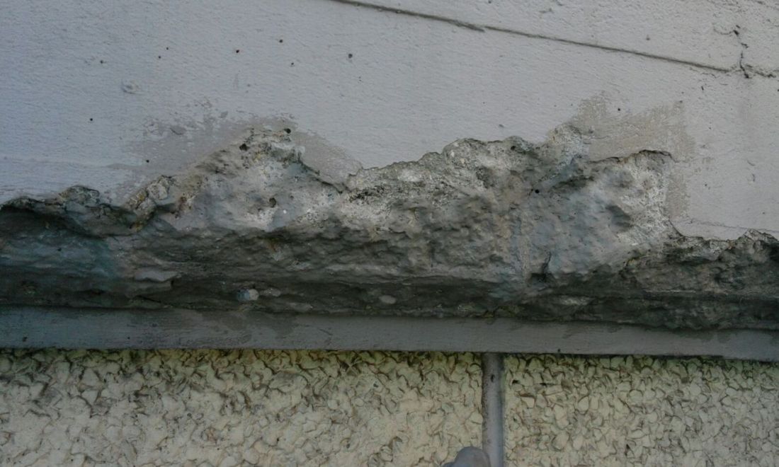 Imagen de saneamiento y protección de barilla en cornisa deteriorada con Sika 910